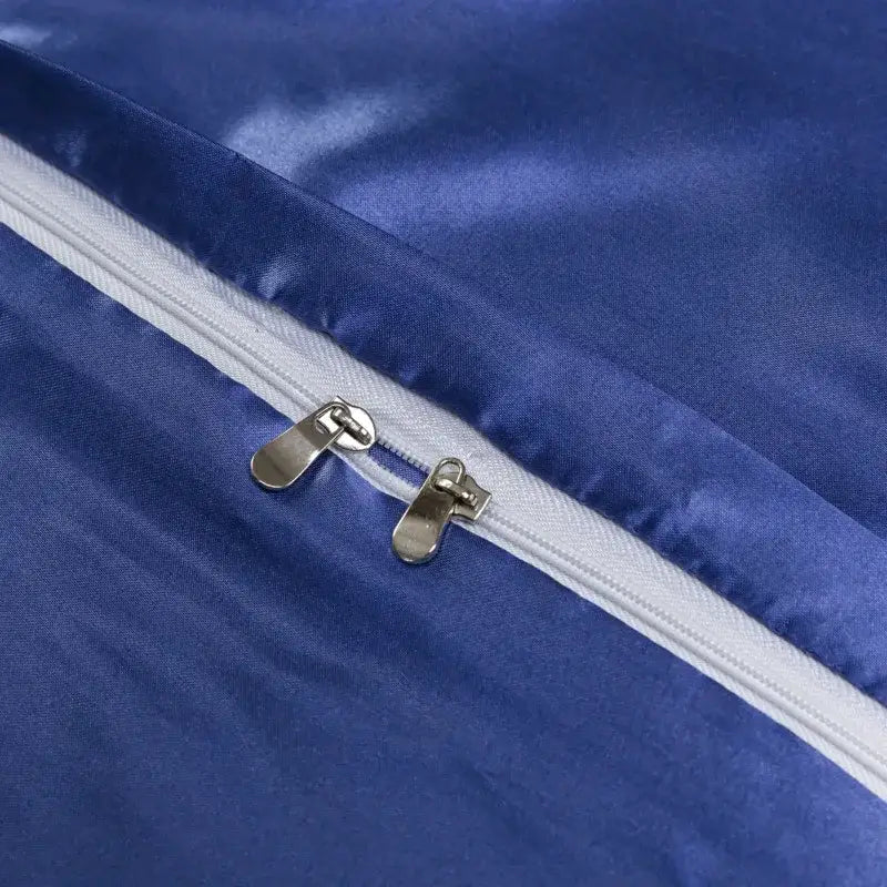 Luxurious royal blue satin duvet cover with white zipper and silver slider pulls in decorbites ice rayon pillowcase set