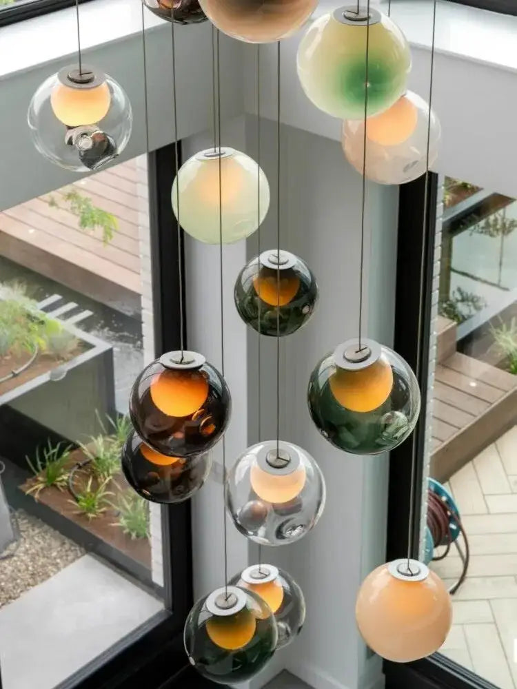 Luxury amber glass sphere pendant light with clear glass pendant globes in gradient hues for dining room decorbites clear glass