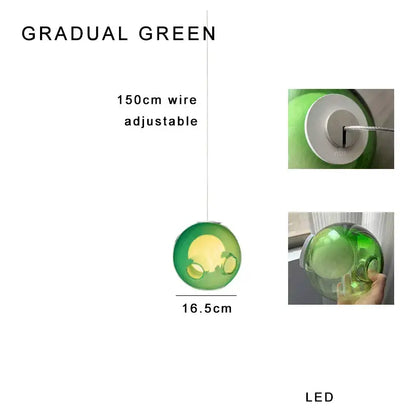 Luxury amber glass sphere pendant light with gradient green translucent glass and adjustable wire suspension decorbites clear glass pendant light
