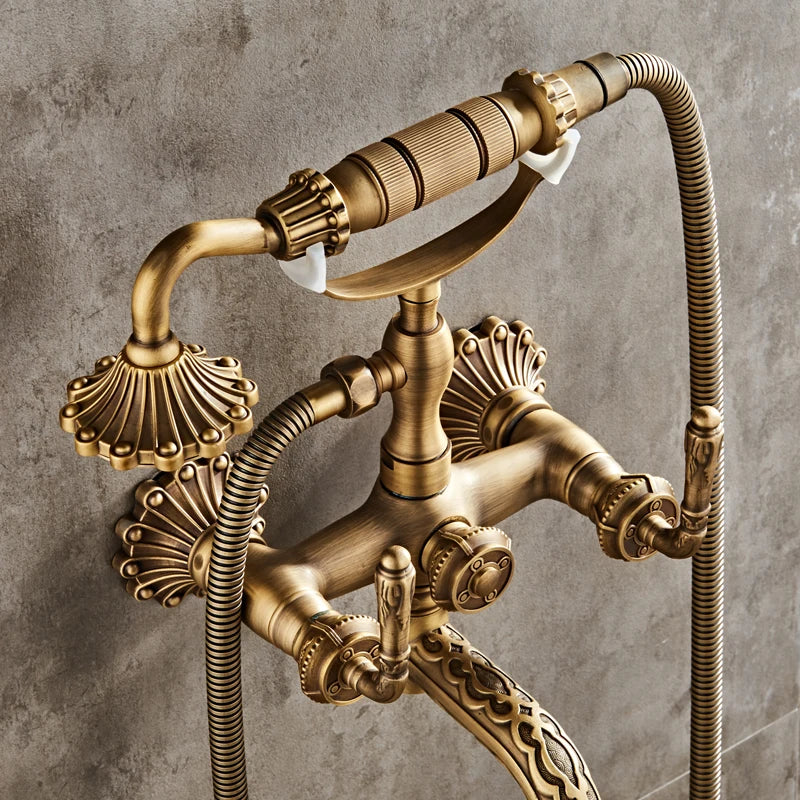 Luxury antique brass wall mounted shower faucet with ornate shell handles and decorative scrollwork mixer tap set xt334