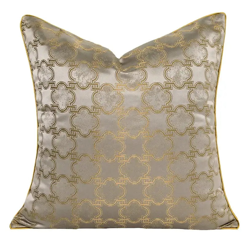 Luxury square pillow cover with metallic silver satin and decorbites gold quatrefoil geometric pattern and piping