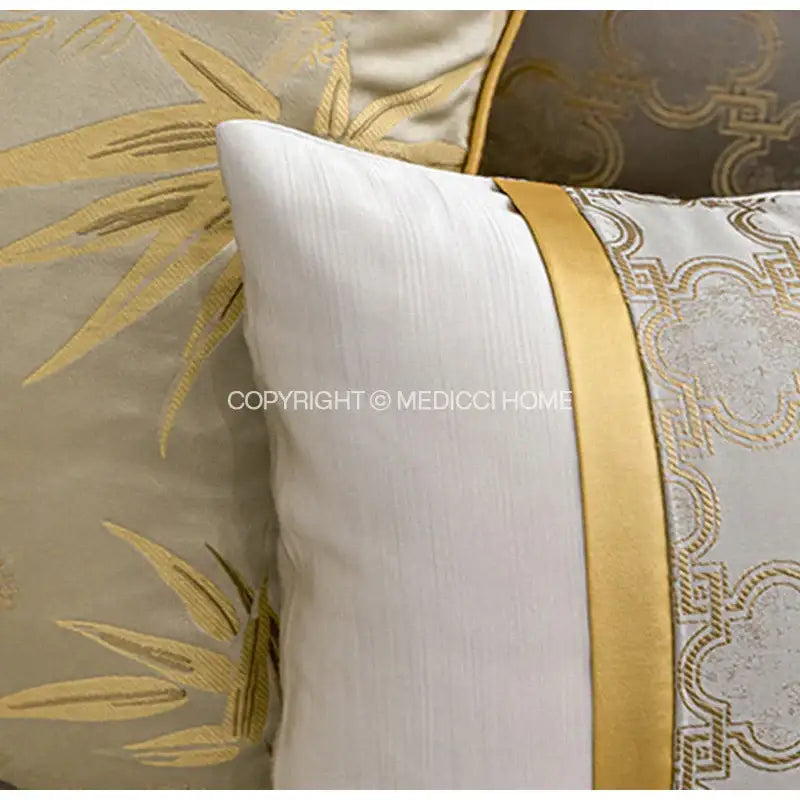 White textured pillow cover with gold satin stripe and embroidered golden bamboo pattern decorbites gold quatrefoil geometric