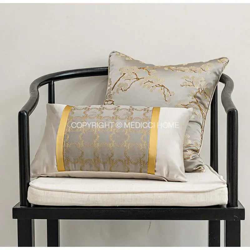 Two elegant gray silk pillow covers with gold quatrefoil geometric embroidery and golden satin stripes for decorbites decorbites gold quatrefoil