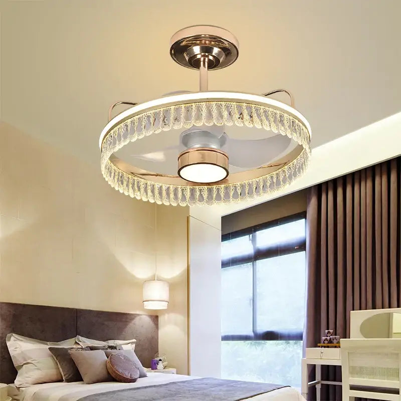 Luxury black and gold crystal ceiling fan chandelier with gold-toned metal and clear dangling crystals for bedroom lighting