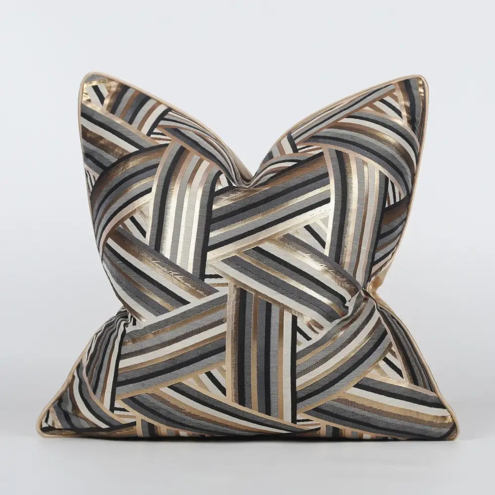 A luxury black and gold geometric jacquard cushion cover with bold interwoven stripes for elegant living room decorbites jacquard high-end decor