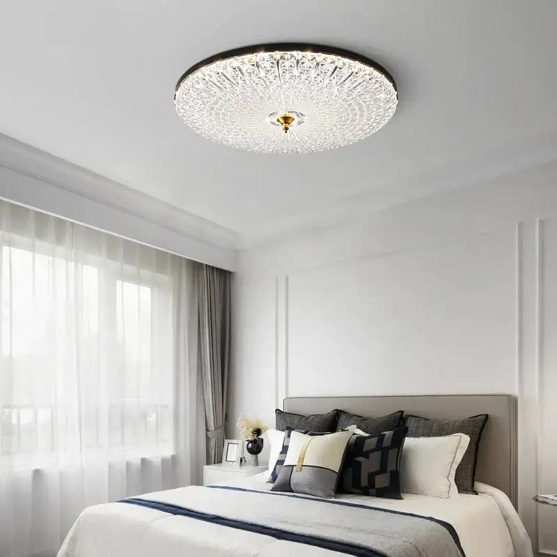 Luxury black and gold glass round ceiling lamp with intricate crystal design and central gold-toned fixture for bedroom
