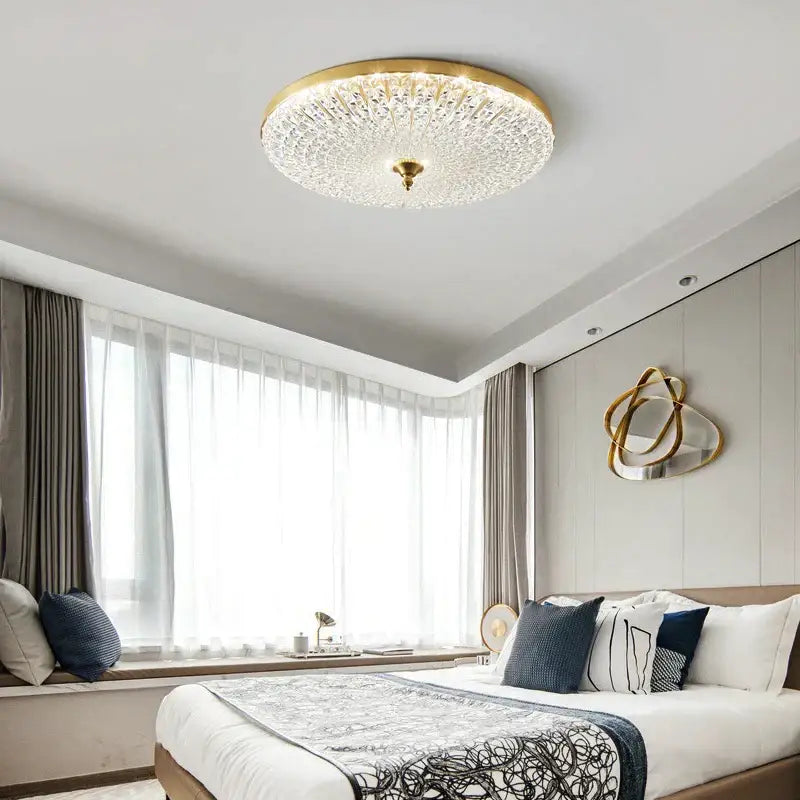 Luxury black and gold glass round ceiling lamp with gold-toned frame and faceted crystal glass panels for bedroom