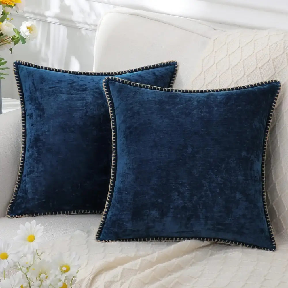 Deep navy velvet square throw pillows with black stitched edges featuring decorbites blue chenille cushion covers design