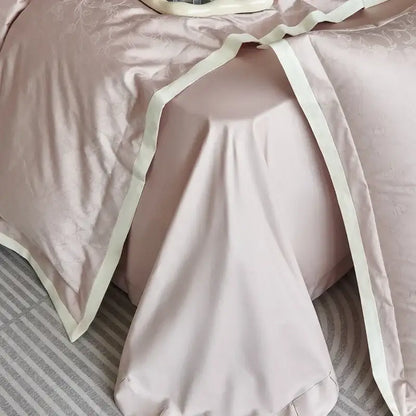 Luxury blush pink floral jacquard satin duvet cover set with delicate embroidery and cream piping for bedroom bedding