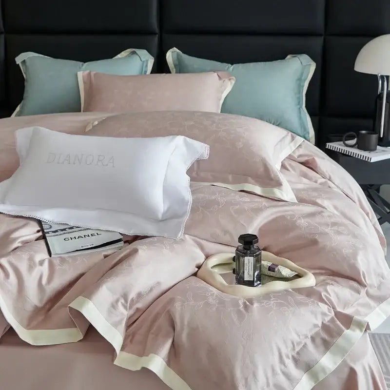Luxury blush pink floral jacquard satin duvet cover set with delicate embroidery and cream piping for bedroom bedding