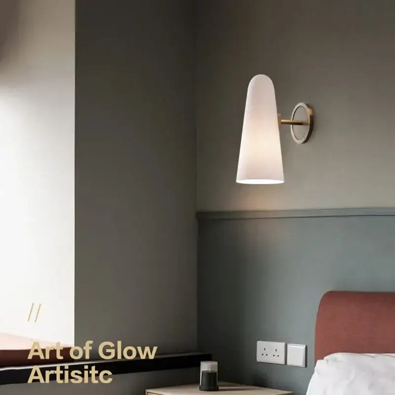 Luxury brass and frosted white glass copper wall lamp with sleek arm and circular backplate for bedroom decorbites copper wall