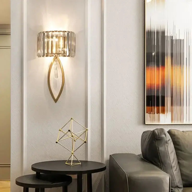Luxury brass crystal wall lamp with cylindrical ribbed glass shade and gold-toned frame for bedroom decorbites crystal wall lamp