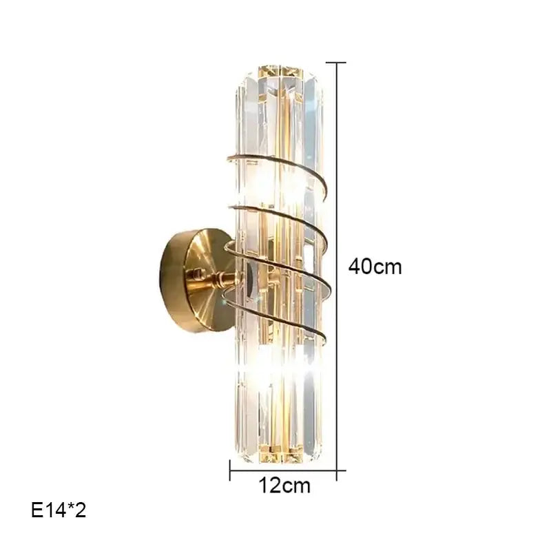Luxury brass crystal wall lamp with gold-toned metal spiral frame and ribbed glass accents for elegant bedroom decorbites wall lamp