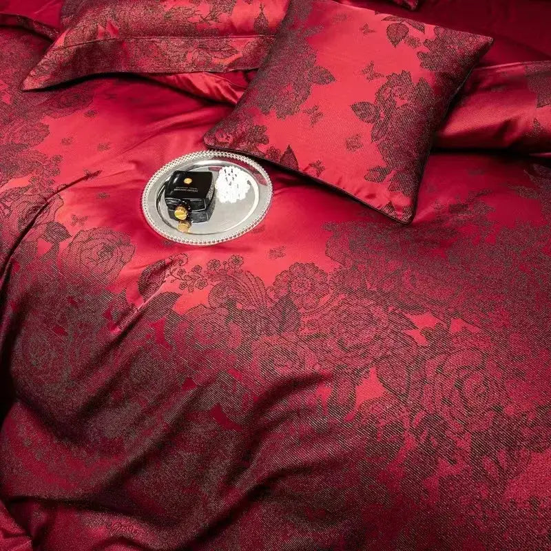 Luxury burgundy red egyptian cotton bedding set with rich crimson satin bedspread featuring intricate dark floral jacquard pattern