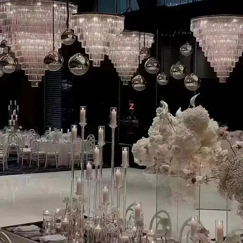 Luxury cascading crystal ice bar chandelier with white floral centerpiece and hanging mirrored spheres by decorbites crystal ice