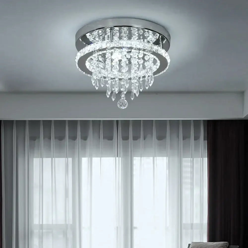 Luxury chrome crystal led ceiling chandelier with sleek chrome base and cascading clear glass droplets for dining room decorbites crystal led