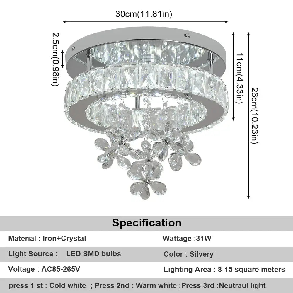 Luxury chrome crystal led ceiling chandelier with three tiers of faceted crystals and flower-shaped accents by decorbites