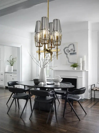 Luxury copper and glass chandelier with multiple cylindrical shades on a brass frame by decorbites for dining room lighting fixture