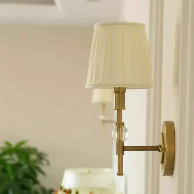 Luxury copper wall lamp with brass sconce, pleated cream fabric shade, and crystal accent for bedroom decorbites copper wall lamp