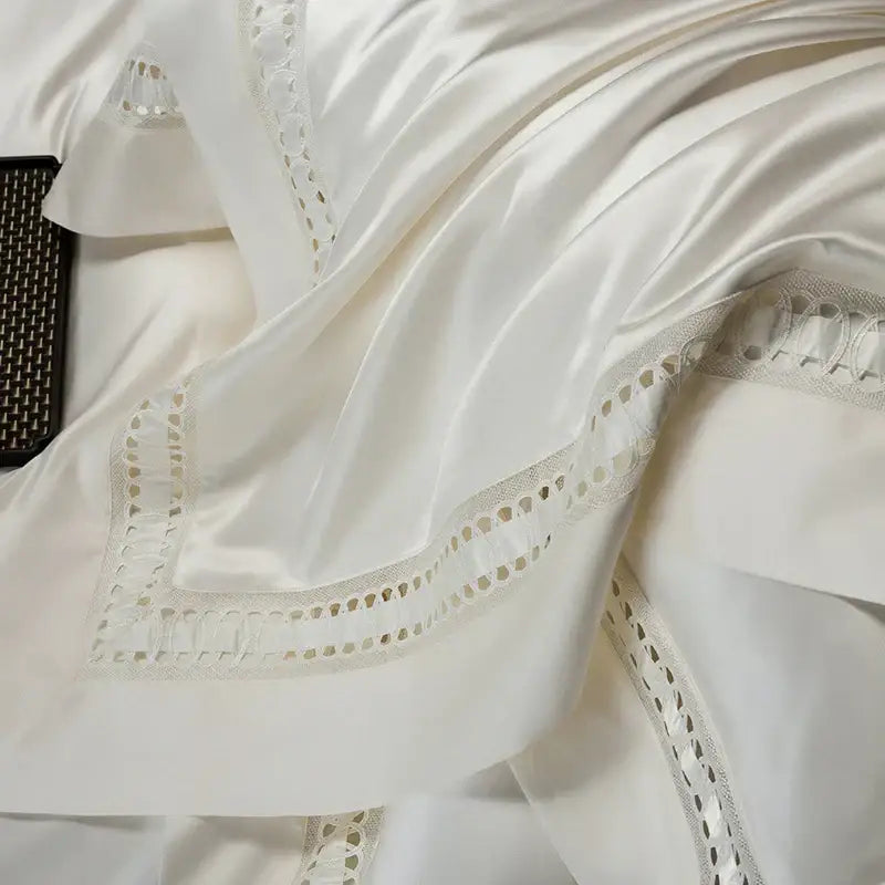 A luxurious white satin pillowcase with lace trim from the decorbites 1000tc egyptian cotton bedding set