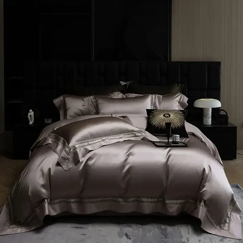 Luxury rose gold satin bedding set with elegant beaded trim and matching pillows featuring 1000tc egyptian cotton