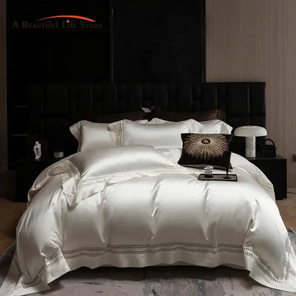 Luxury cream bedding set in 1000tc egyptian cotton with black embroidered trim and ornate gold sunburst pillow decorbites 1000tc egyptian