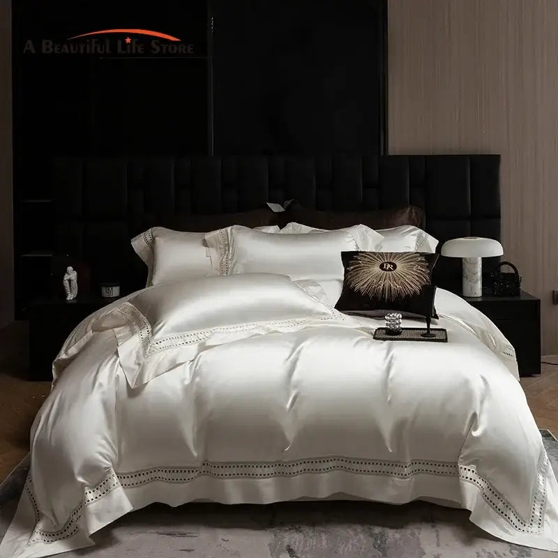 Luxury cream bedding set in 1000tc egyptian cotton with black embroidered trim and ornate gold sunburst pillow decorbites 1000tc egyptian