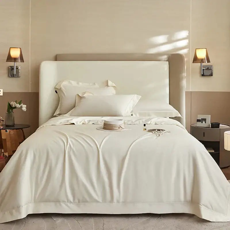 Cream-colored satin bedding set with smooth luxurious texture and subtle sheen made from decorbites 1400tc pima cotton