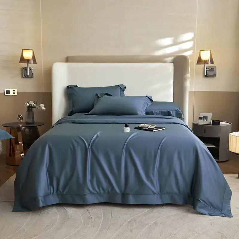 Luxurious navy blue satin bedding set with smooth glossy finish and matching pillowcases from decorbites 1400tc pima cotton collection