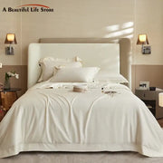Cream-colored satin bedding set with smooth texture and elegant pleats in decorbites 1400tc pima cotton material