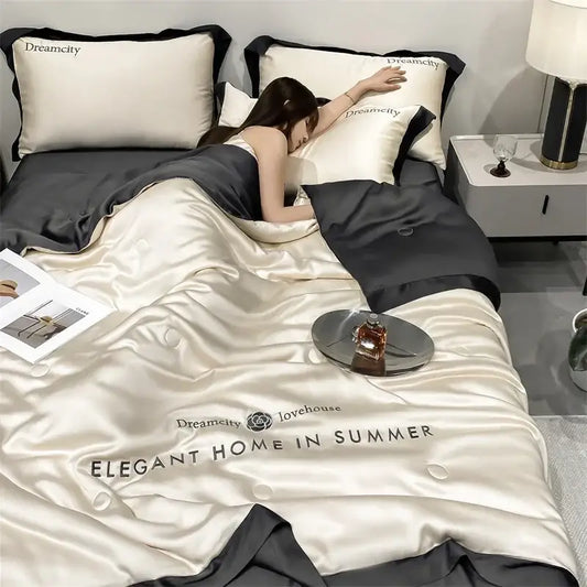 Luxury cream and black ice silk embroidered quilt set featuring a satin duvet cover with elegant home in summer text
