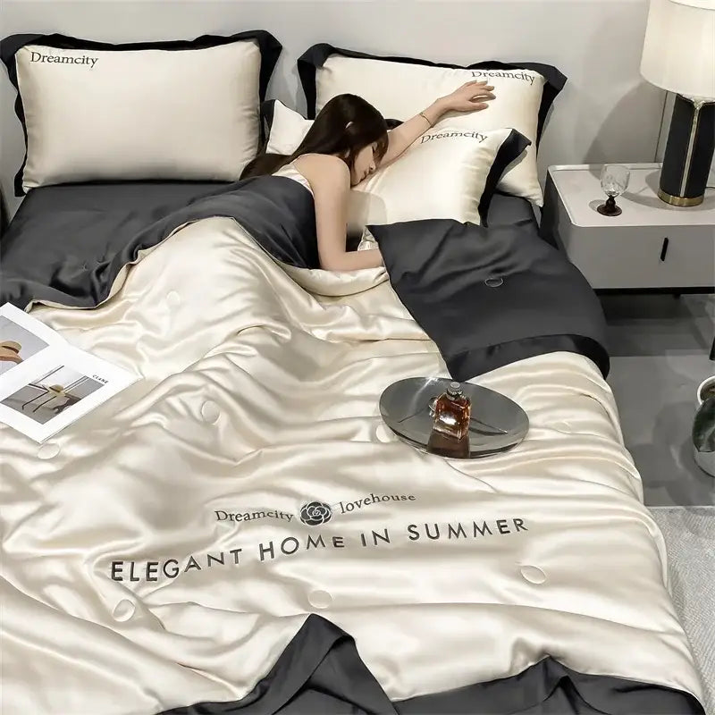 Luxury cream and black ice silk embroidered quilt set featuring a satin duvet cover with elegant home in summer text