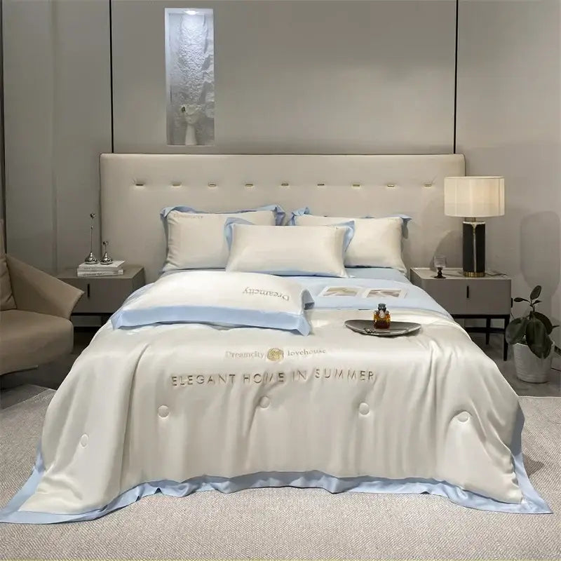 Luxury cream and black ice silk embroidered quilt set featuring light blue and white satin with elegant home in summer text