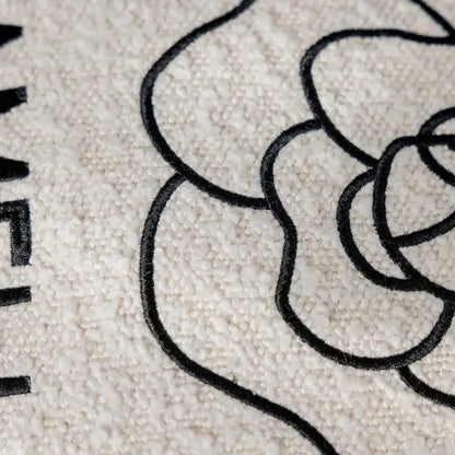 Luxury cream and black decorbites camellia jacquard pillow cover with bold embroidered floral design for living room decor