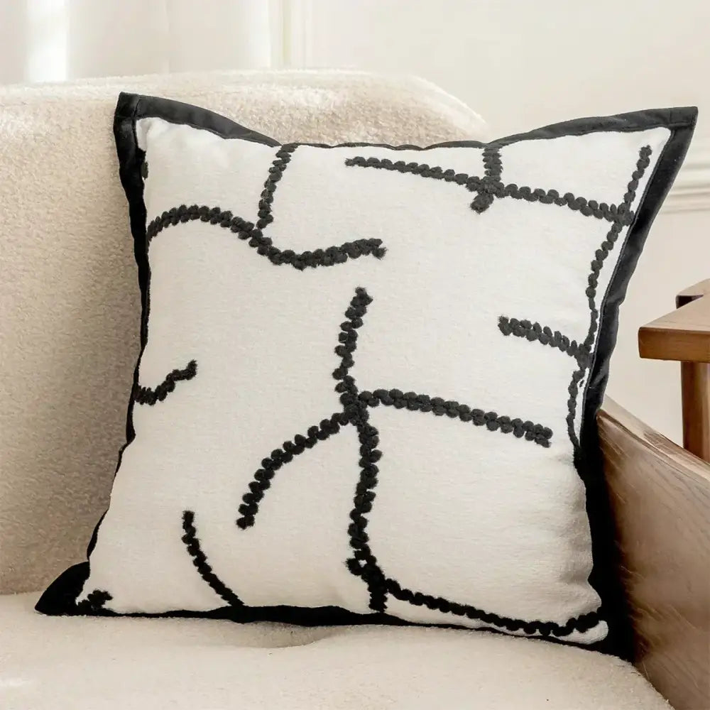 Luxury cream and black decorbites camellia jacquard pillow cover with black embroidered lines and satin border for living room decor