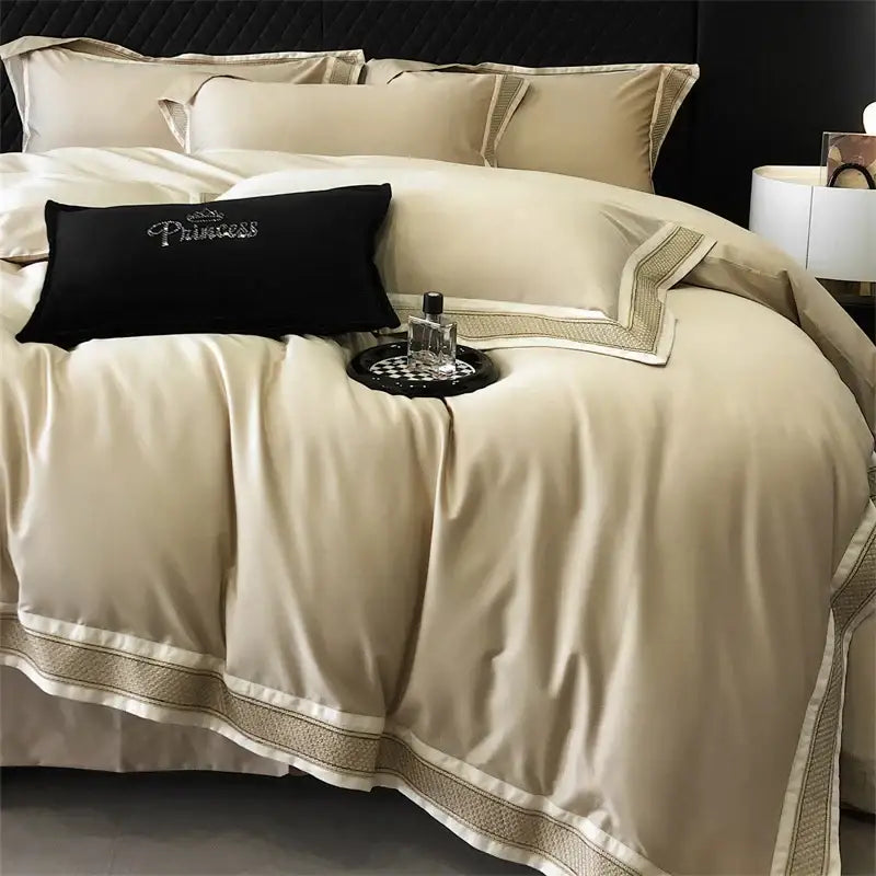 Luxury cream and gold decorbites 1000tc luxury embroidery bedding set featuring satin fabric and black princess pillow