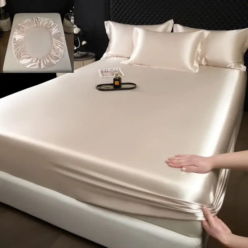 Luxury cream mulberry silk fitted sheet set with smooth glossy satin finish and elasticized edges for a fitted sheet set