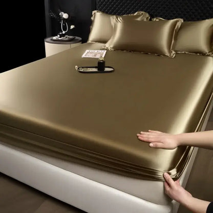 Luxury cream mulberry silk fitted sheet set in gold satin with matching pillowcases for elegant bedroom bed linen