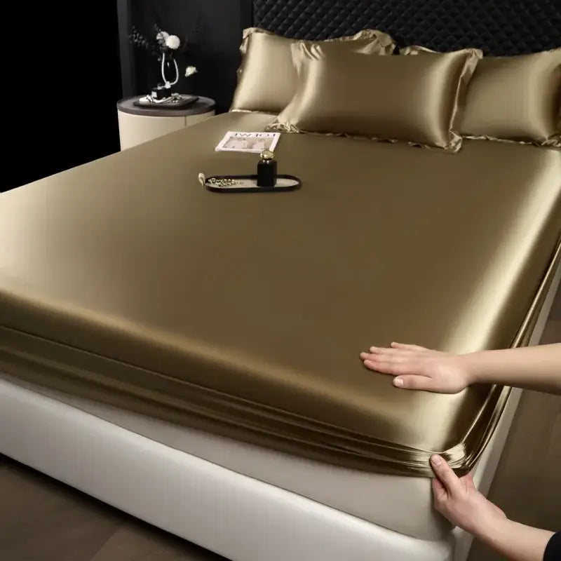 Luxury cream mulberry silk fitted sheet set in gold satin with matching pillowcases for elegant bedroom bed linen