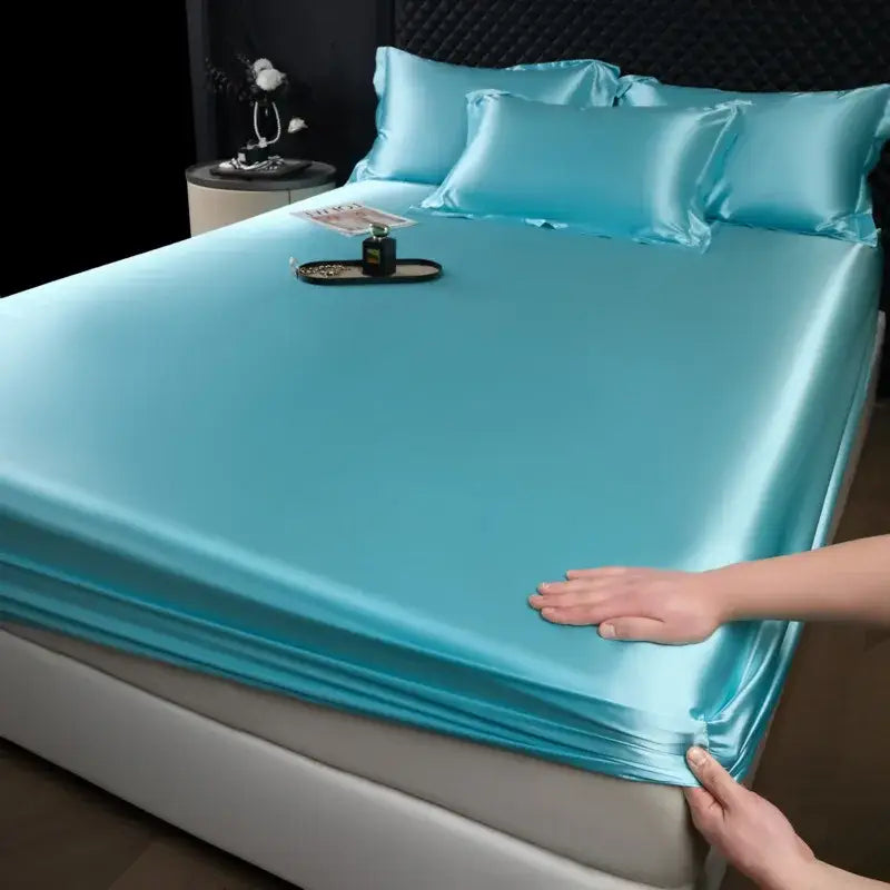 Luxury cream mulberry silk fitted sheet set with light blue satin fitted sheet and matching pillowcases for bedroom use