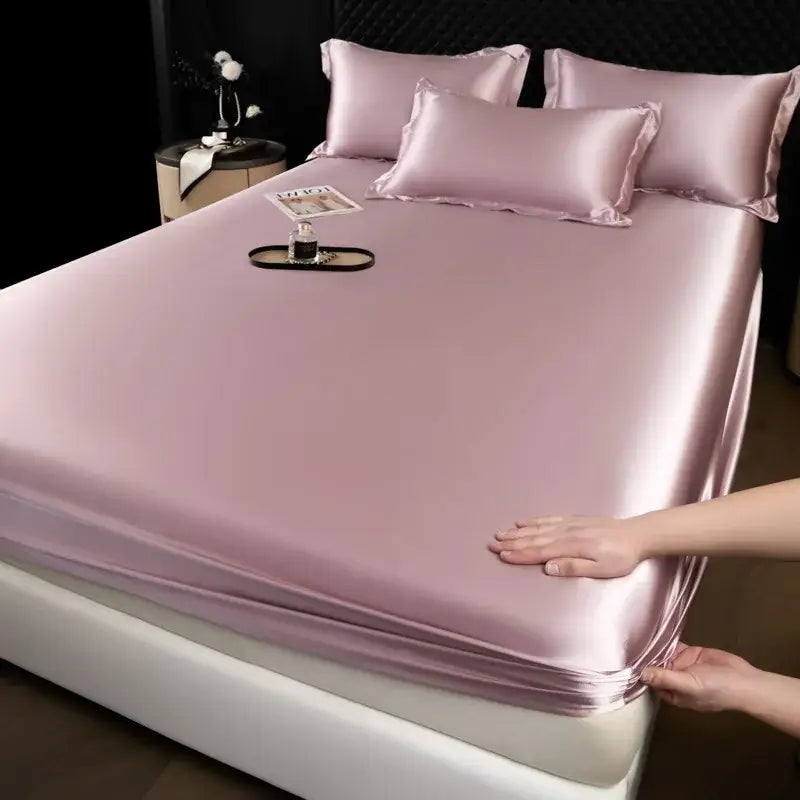 Luxury cream mulberry silk fitted sheet set in soft satin lavender with matching pillowcases for elegant bedroom linen