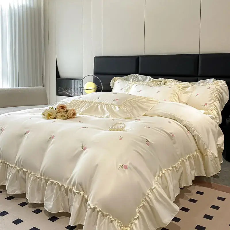 Luxury cream and pink ice silk floral bedding sets with delicate embroidery and ruffled edges by decorbites ice silk