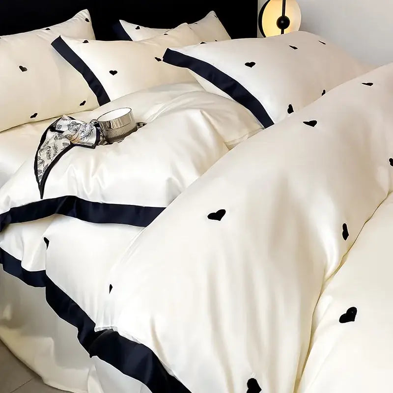 Luxury cream satin duvet cover set with black heart embroidery navy blue ruffled trim ice silk bedding sets decorbites ice silk