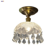 A luxury crystal brass ceiling lamp with teardrop crystals for living room decorbites glass grid led lighting