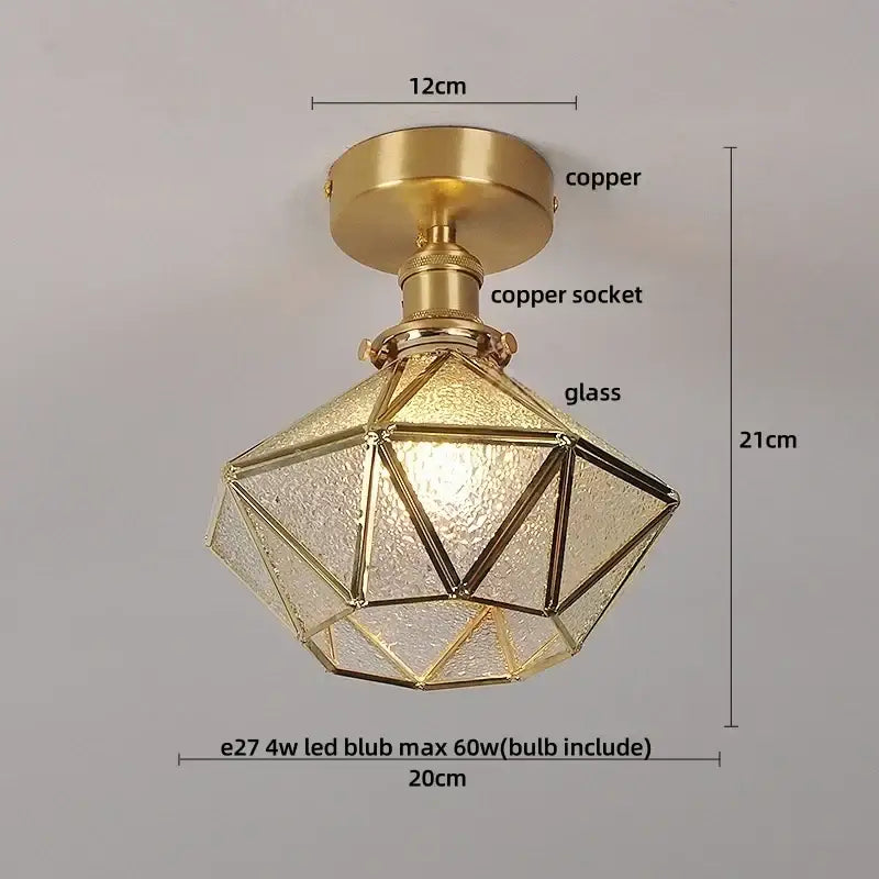 Luxury gold-toned ceiling lamp with decorbites glass grid and copper hardware features a faceted glass grid led design