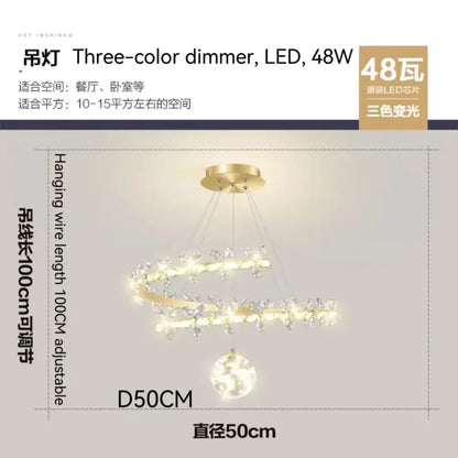 Luxury crystal gold ceiling chandelier with gold-toned spiral design, crystal accents, spherical pendant, and three-color led lighting