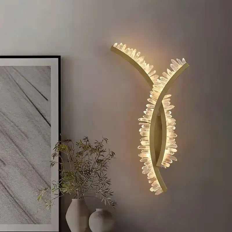 Luxury crystal gold metal wall sconce with y-shaped design and clear accents emitting warm glow for living room decorbites crystal gold