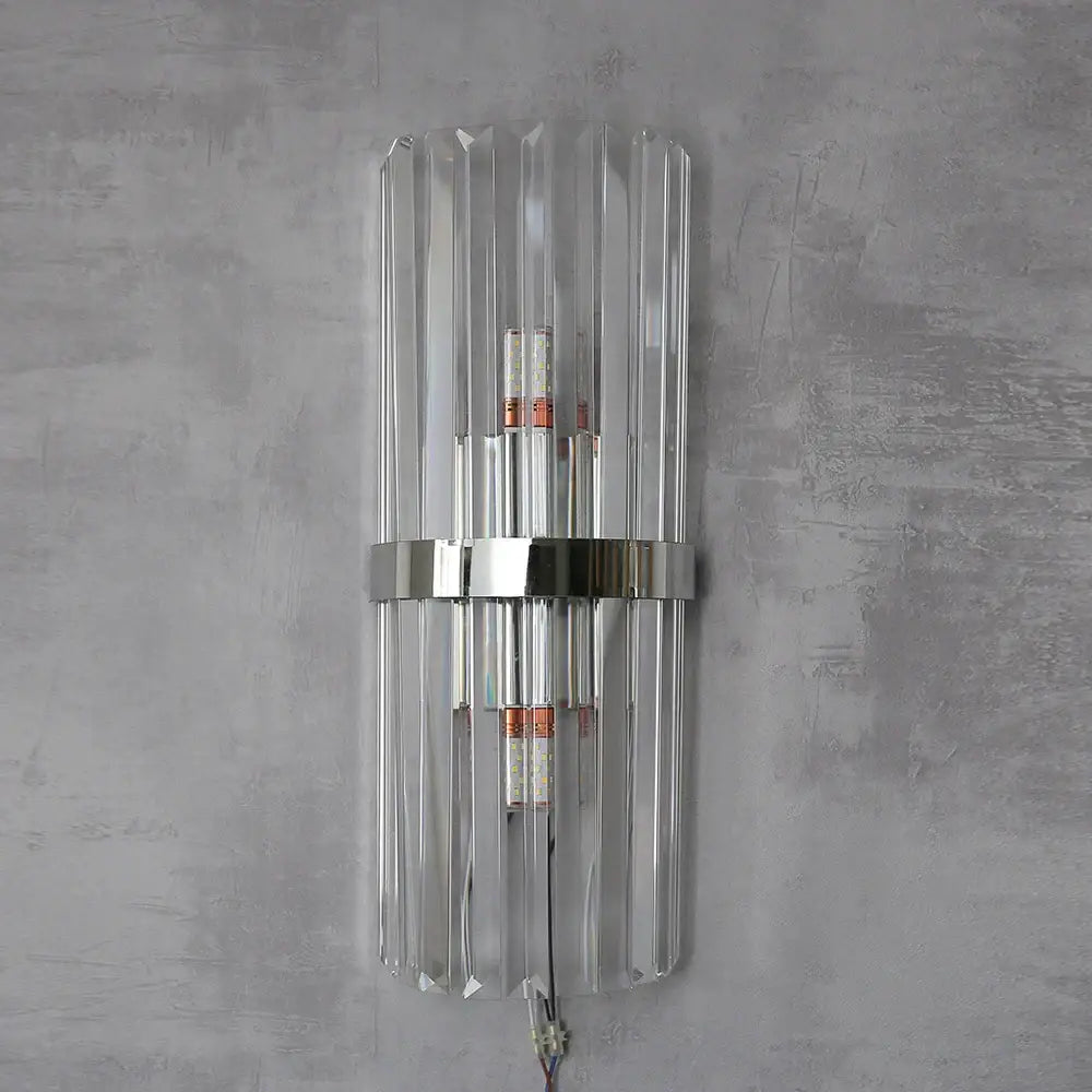 Luxury crystal golden wall lamp featuring a clear crystal glass sconce with sleek chrome accent by decorbites