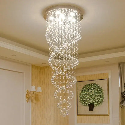 Luxury decorbites crystal staircase chandelier with cascading clear faceted beads and circular metallic base for bedroom lighting