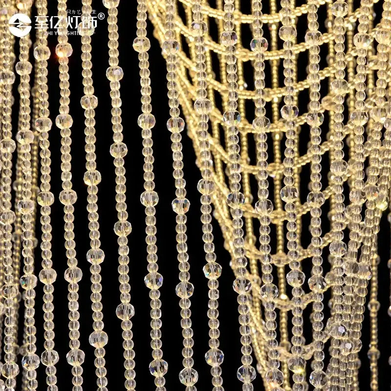 Golden chandelier with cascading clear faceted crystal beads in white decorbites crystal tassel stair chandelier design